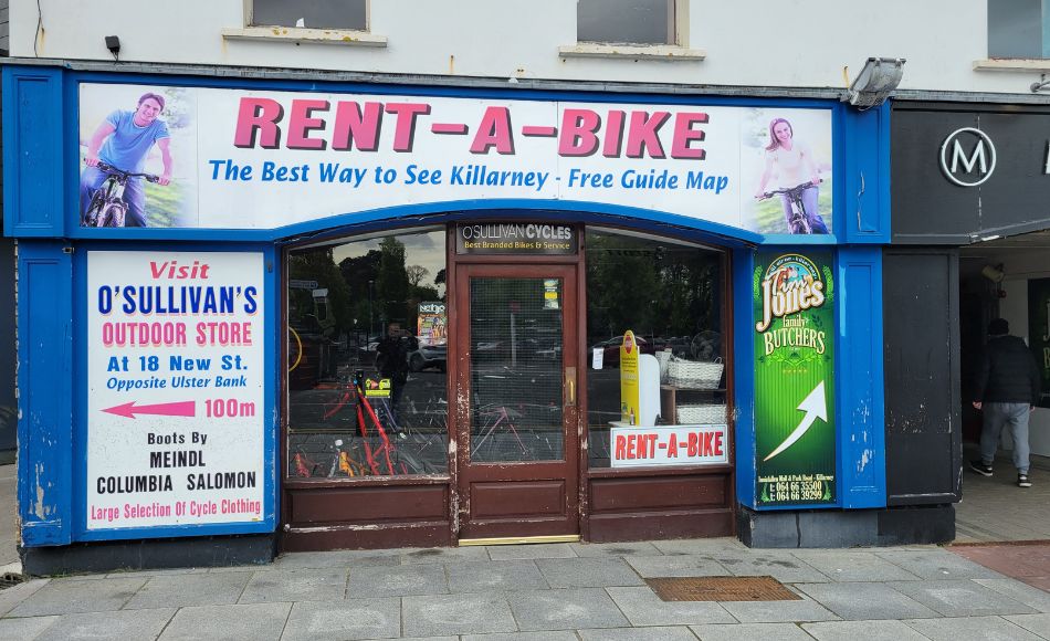 A photo of a bike rental storefront in Killarney town center, near the national park.