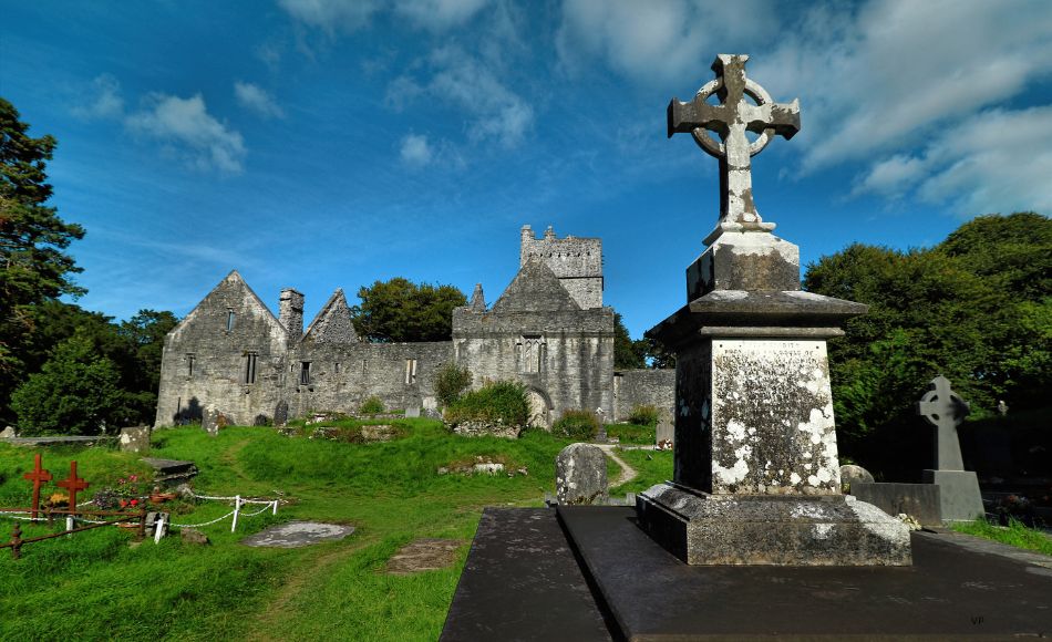 View of Muckross Abbey and cemetery in Killarney, Ireland.